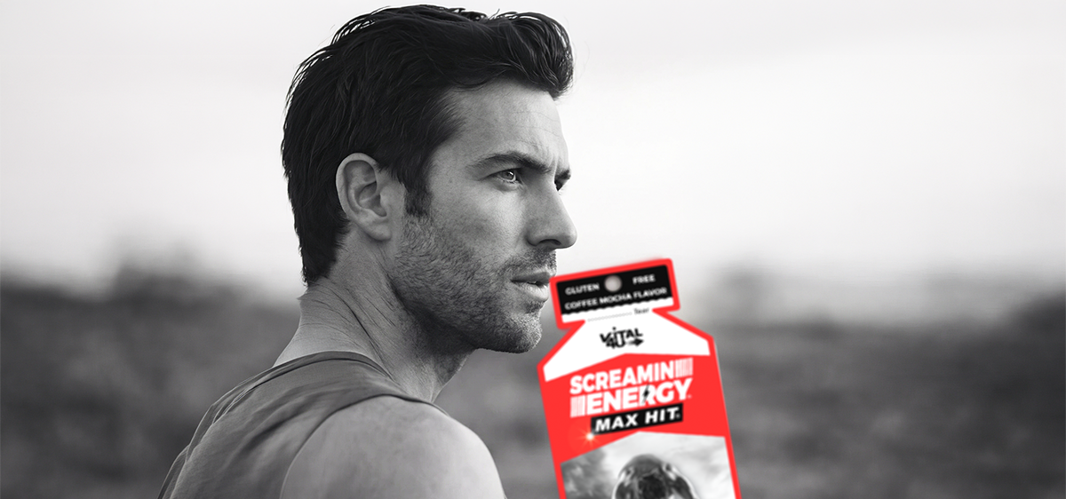 Athlete comparing energy shots vs energy drinks before a workout with Vital 4U Screamin Energy MAX HIT
